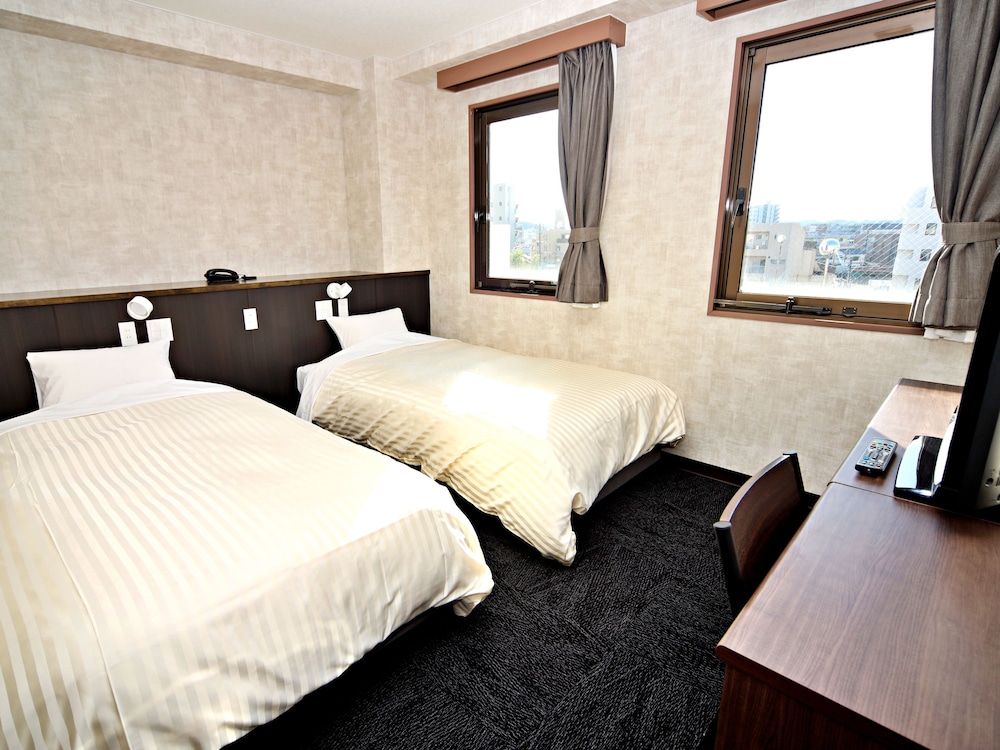 スタンダード ツインルーム 禁煙 : タバコ × | 宮崎ライオンズホテル