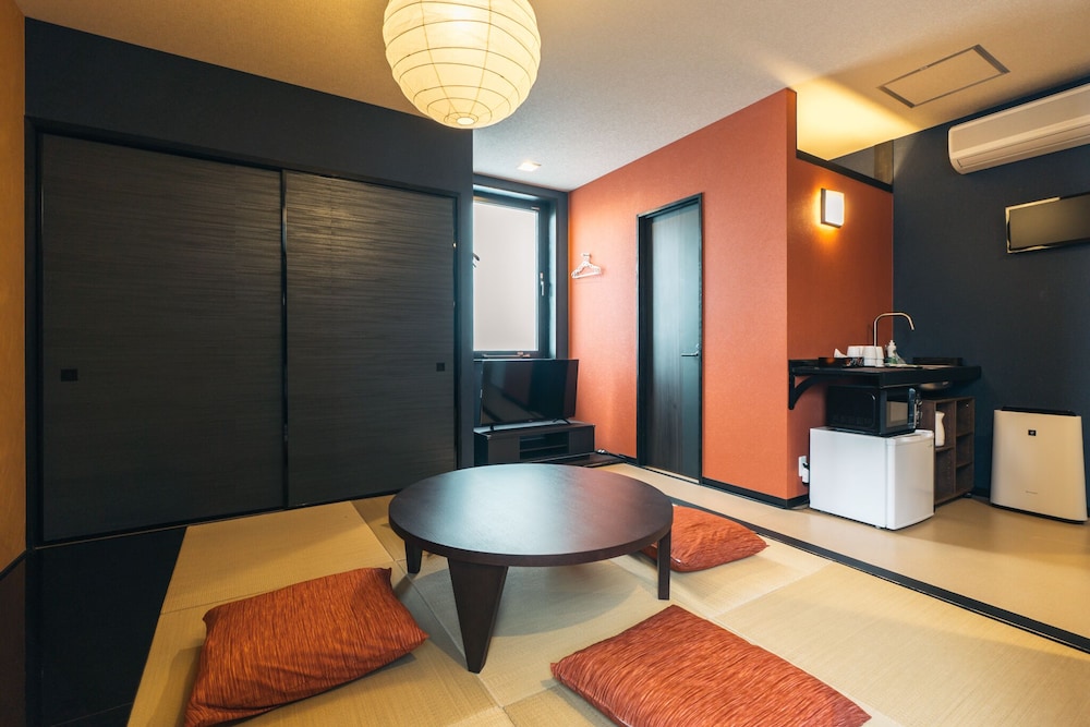 スタンダード ルーム リビング エリア0 | KINGYO - DOYANEN HOTELS