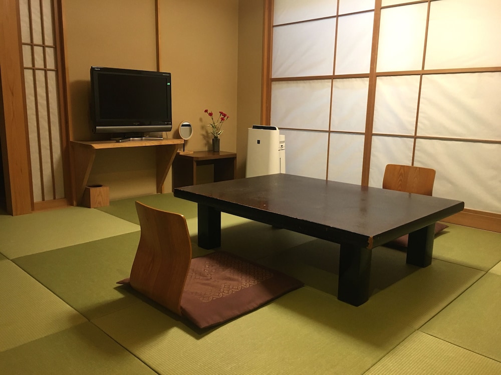 [別邸] 恵季 ~ 源泉かけ流し風呂 - ダブルベッド 客室1 | 淘心庵 米屋