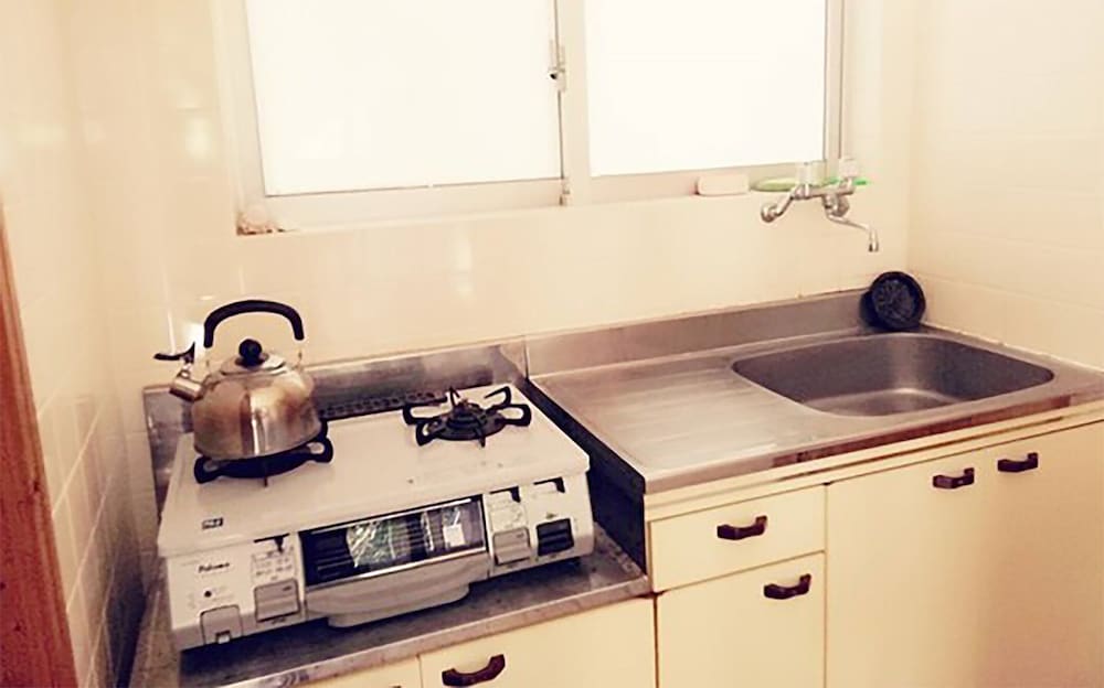 客室1 | ゲストハウスサンセットヒル備瀬