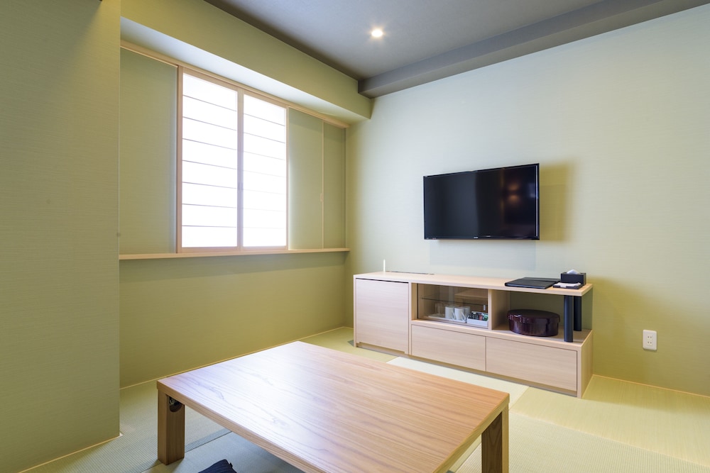 デラックス ルーム シングルベッド 2 台 禁煙 浴槽 リビング エリア0 | ベストウェスタンプラスホテルフィーノ千歳