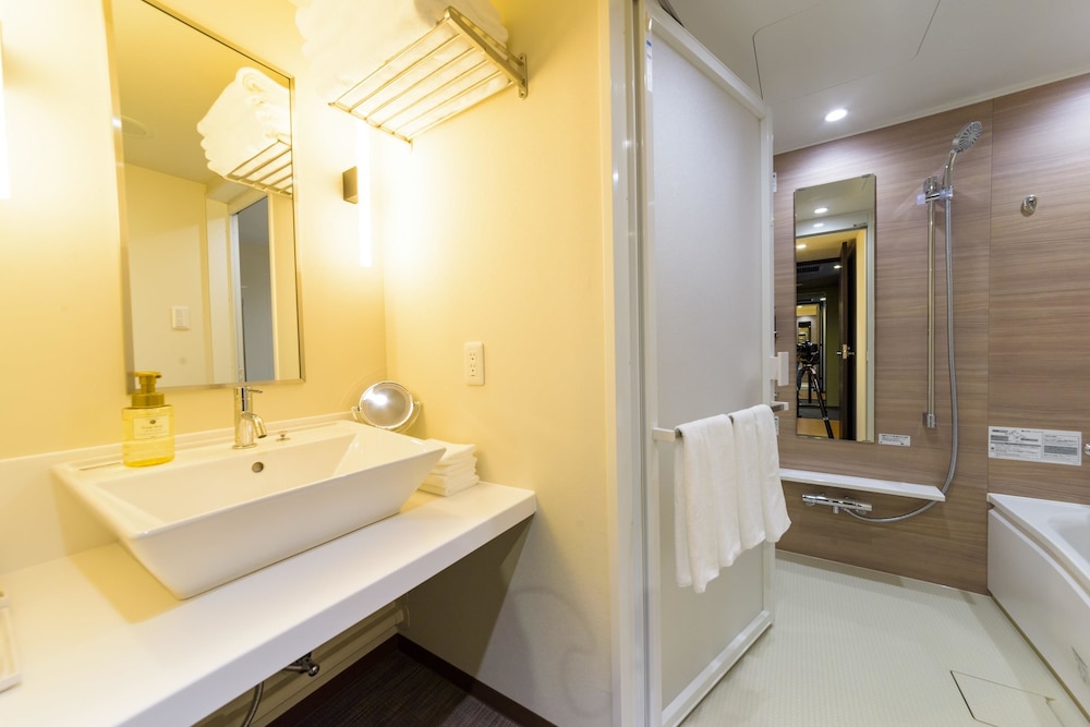 デラックス ルーム シングルベッド 2 台 禁煙 浴槽 バスルーム2 | ベストウェスタンプラスホテルフィーノ千歳