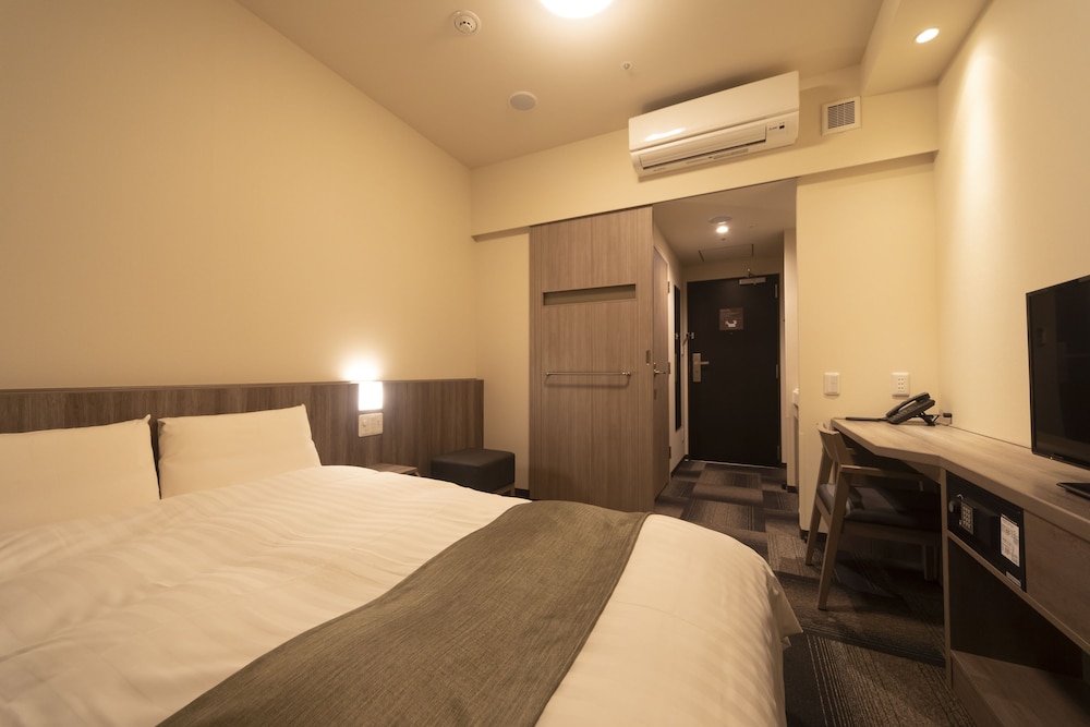 ダブルベッド 客室2 | ドーミーイン後楽園