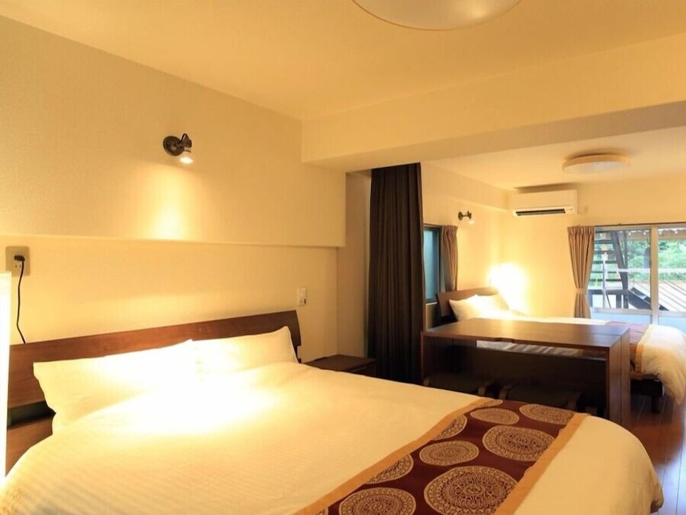 スタジオスイート 客室7 | 石垣島サン・グリーンリゾートホテル