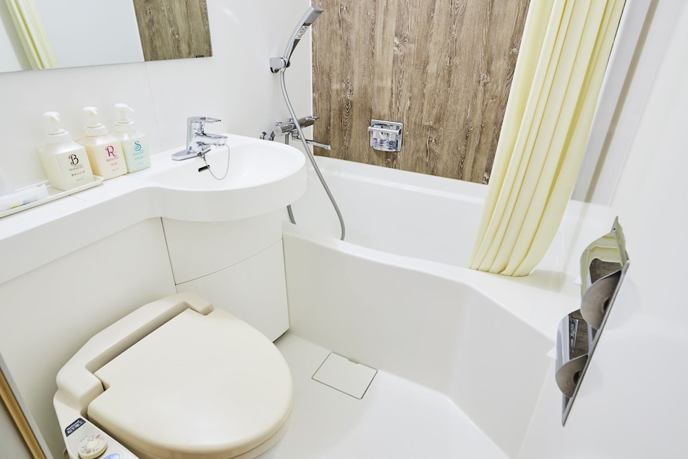 エコノミー ダブルルーム クイーンベッド 1 台 喫煙可 バスルーム0 | 浦安 サン ホテル