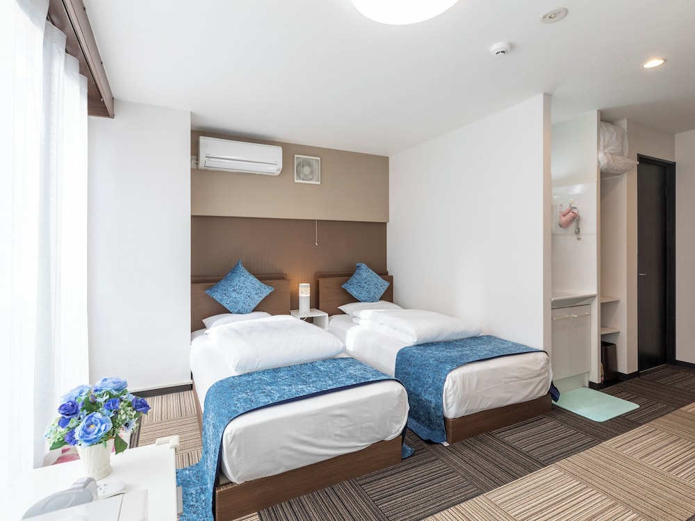 【禁煙】最上階トリプルルーム 客室1 | Tabist 桜川リバーサイドホテル