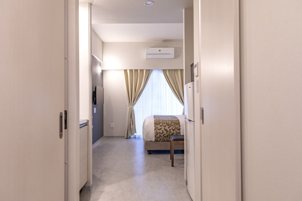 ダブルルーム 客室2 | Mr.KINJO エミネンス inn 牧志