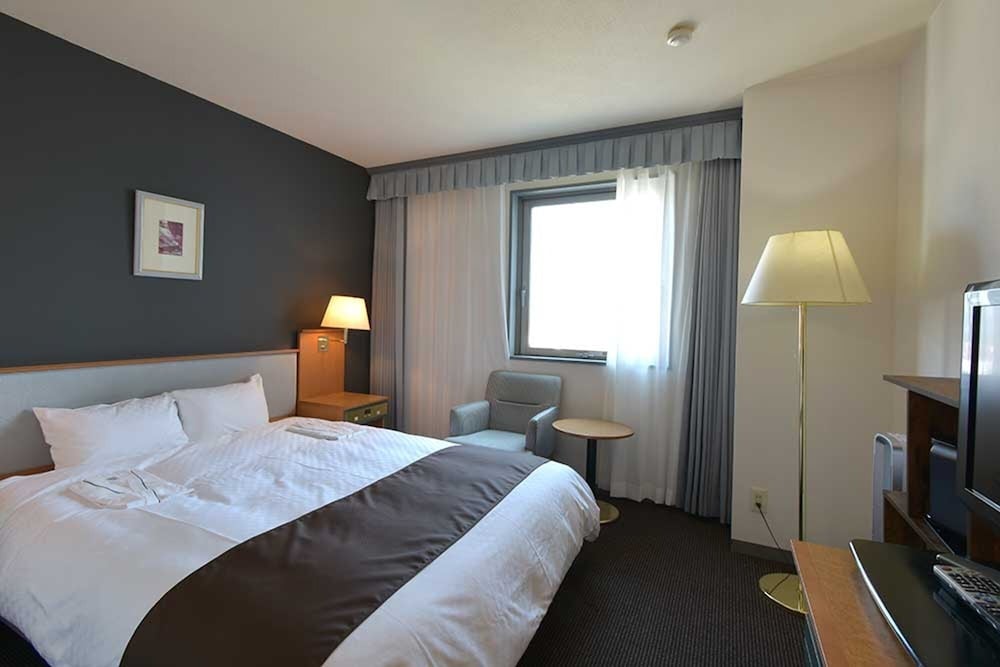 デラックス ダブルルーム クイーンベッド 1 台 | ブロッサムホテル弘前