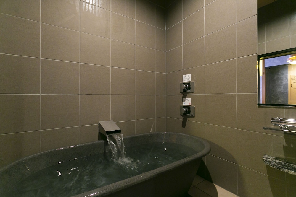 温泉付き和洋室 Twin バスルーム0 | 旅館 吉田屋