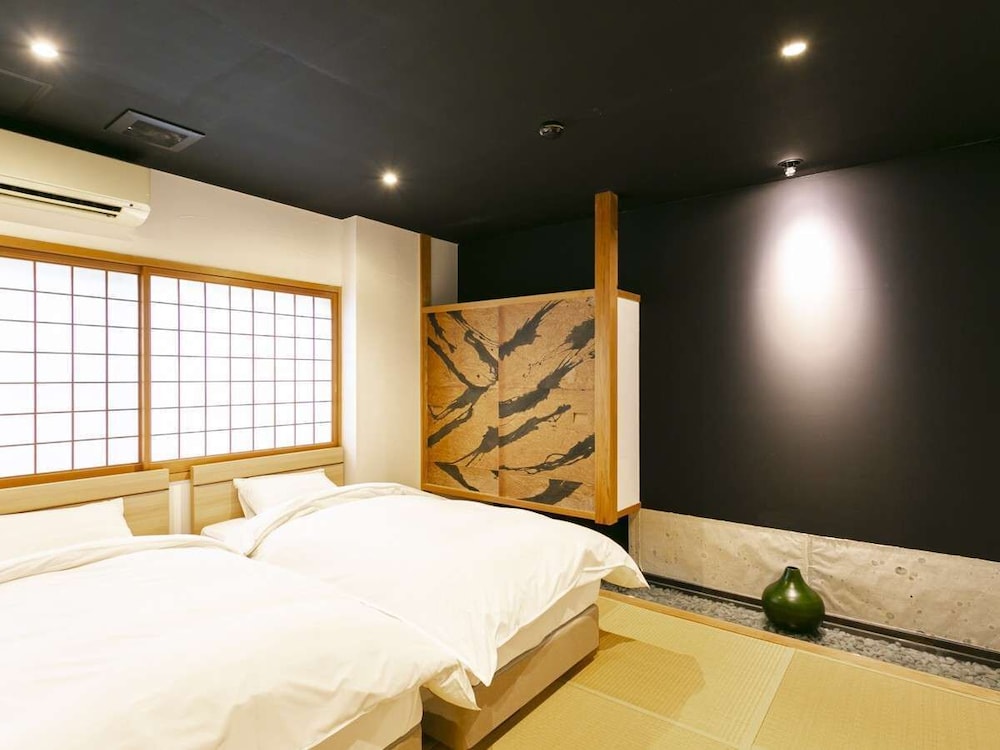 温泉付きハイグレード 洋和室「桜」-sakura- 客室2 | 旅館 吉田屋