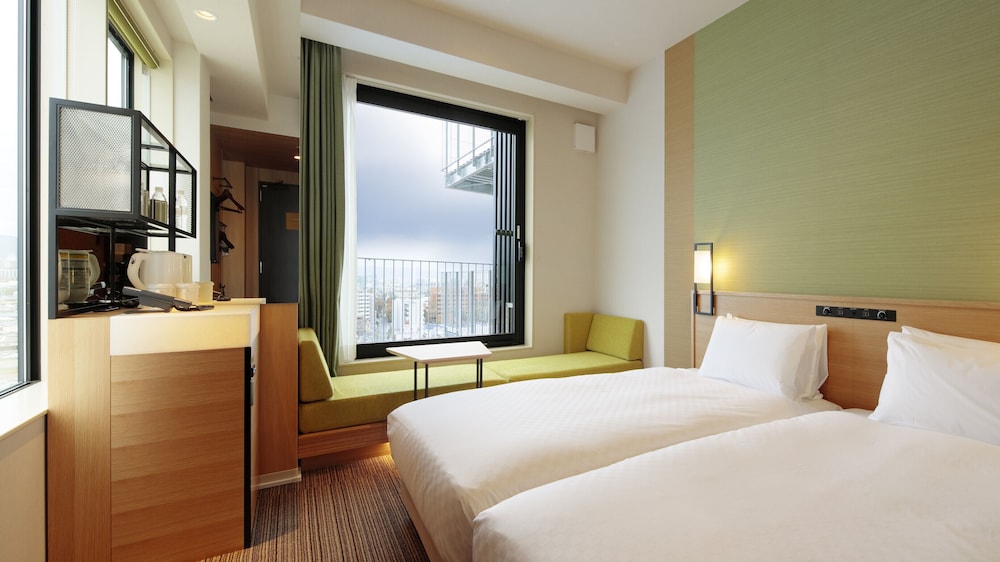 コーナーツインルーム 客室1 | カンデオ ホテルズ 大阪 岸辺