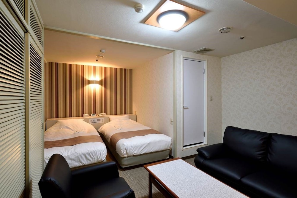 デラックス ツインルーム 喫煙可 客室1 | ホテル定禅寺