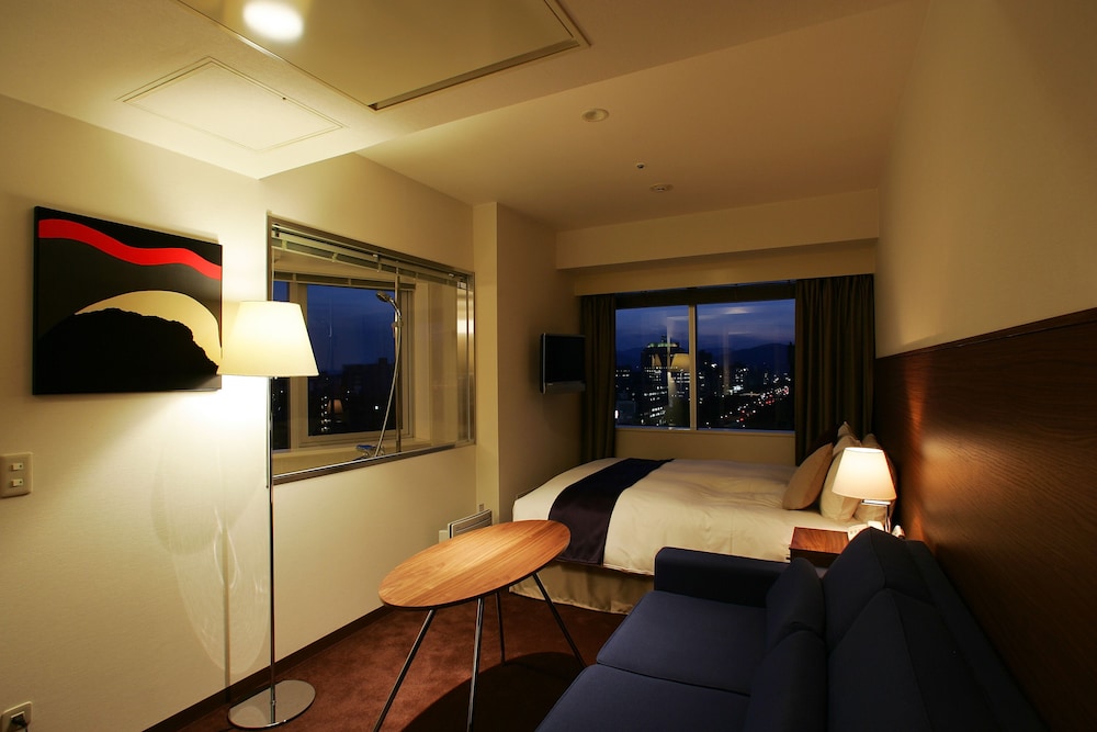 [禁煙]スタイリッシュコーナーダブル(22sqm)〈キングベッド,ビューバス〉 客室1 | オリエンタルホテル広島