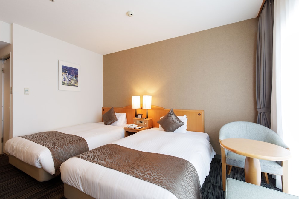 スーペリアツインルームパークビュー 禁煙 24平米 客室1 | 後楽ホテル