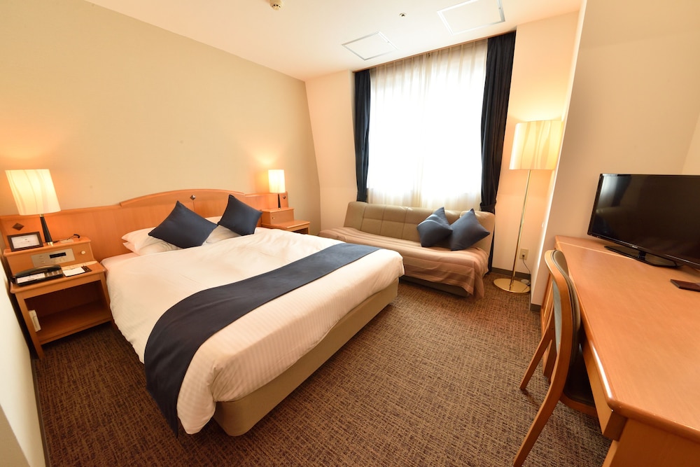 スーペリアダブルルーム クイーンベッド1台 パークビュー 禁煙 (24 sqm) 客室2 | 後楽ホテル