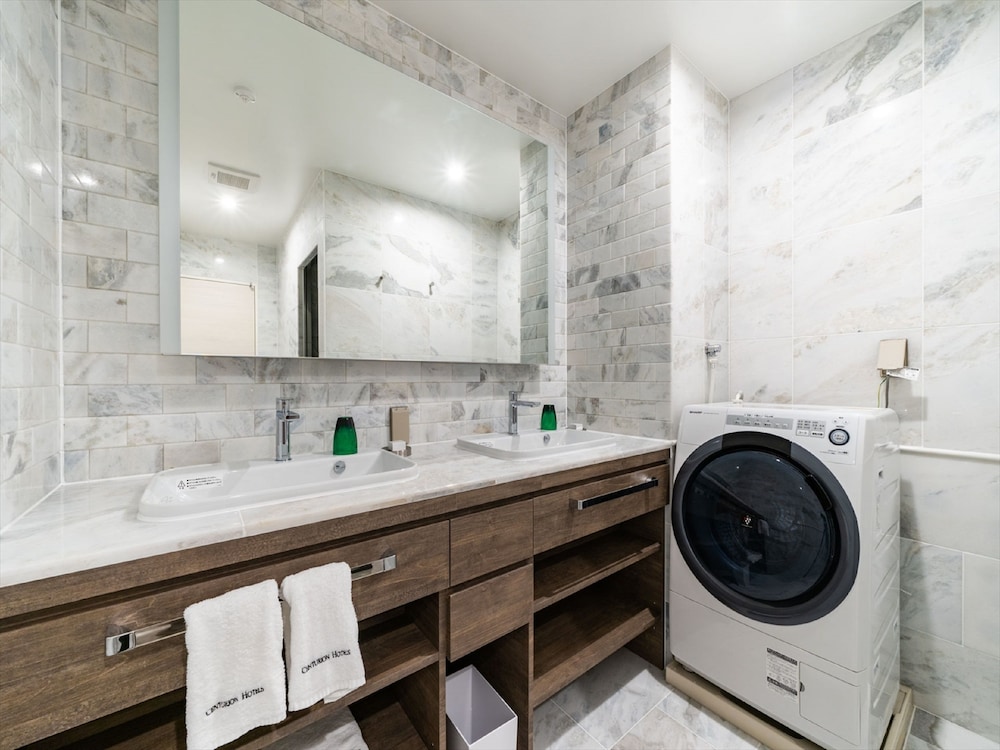 別館 デラックステラスツイン - 4ベッド 禁煙 6 名利用 バスルーム1 | ロイヤルビューホテル美ら海