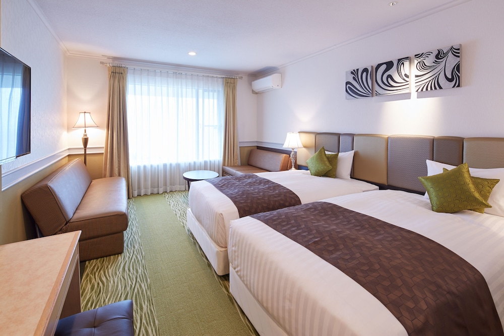 本館 スタンダードツイン 禁煙 4名利用 客室2 | ロイヤルビューホテル美ら海