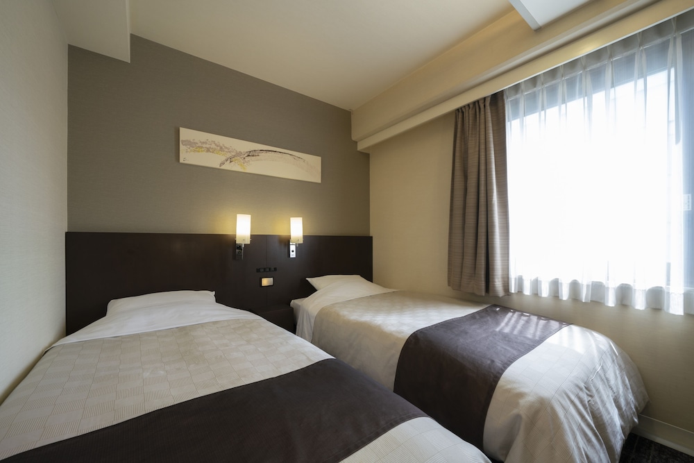 （禁煙）コージーツインルーム（15.7㎡）ベッド幅100㎝ ×2、素泊まり 客室6 | ホテルビナリオ梅田