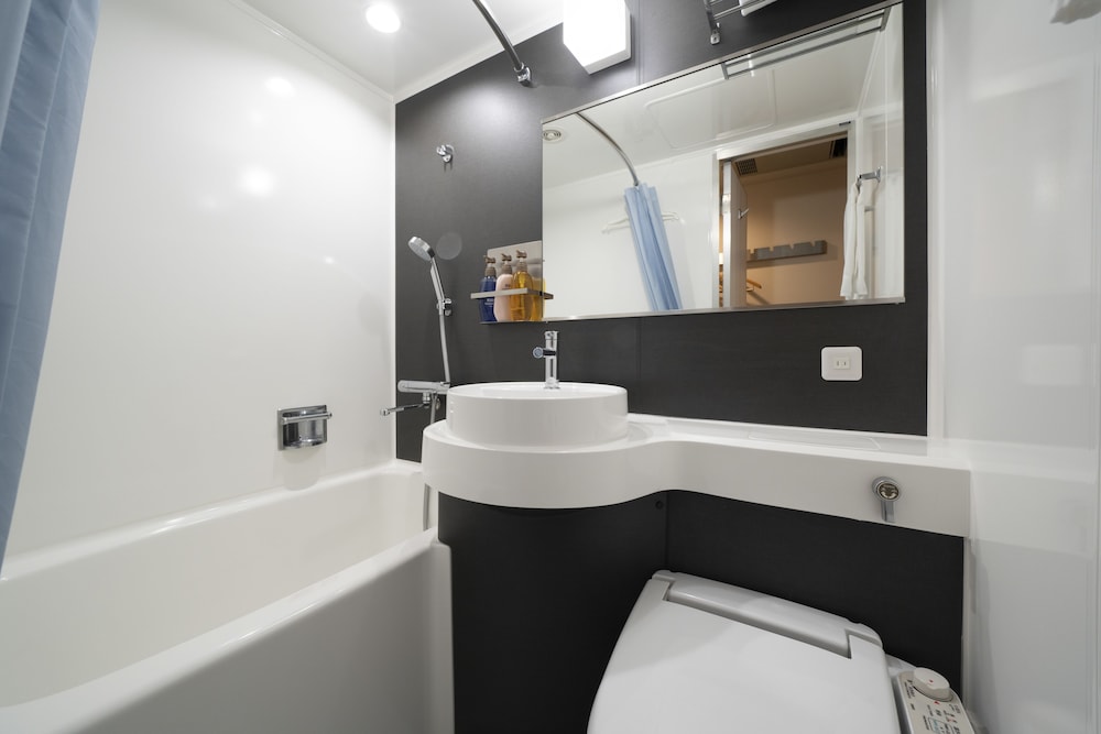 （喫煙）セミダブルルーム（13.3㎡）ベッド幅130㎝、素泊まり バスルーム0 | ホテルビナリオ梅田