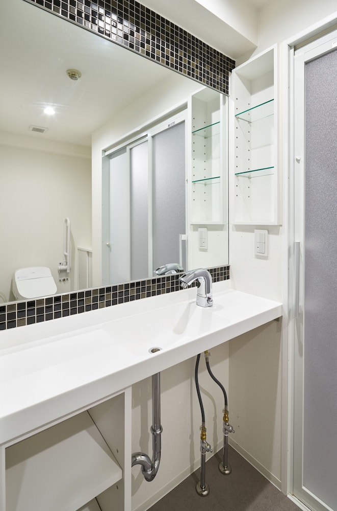 ダブルルームダブルサイズベッド 1 台ソファーベッド付き 客室2 | シティ ホテル N.U.T.S.