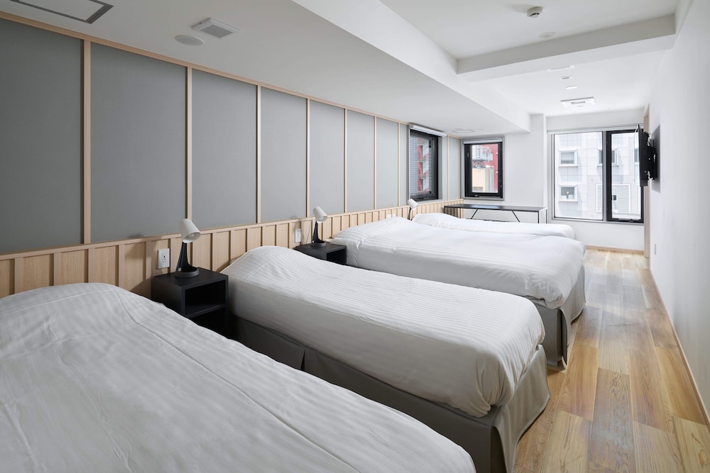 コンフォート ルーム ベッド (複数台) 禁煙 客室4 | シティ ホテル N.U.T.S.