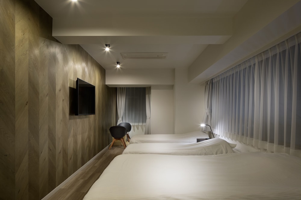 コンフォート ルーム ベッド (複数台) 禁煙 客室2 | シティ ホテル N.U.T.S.