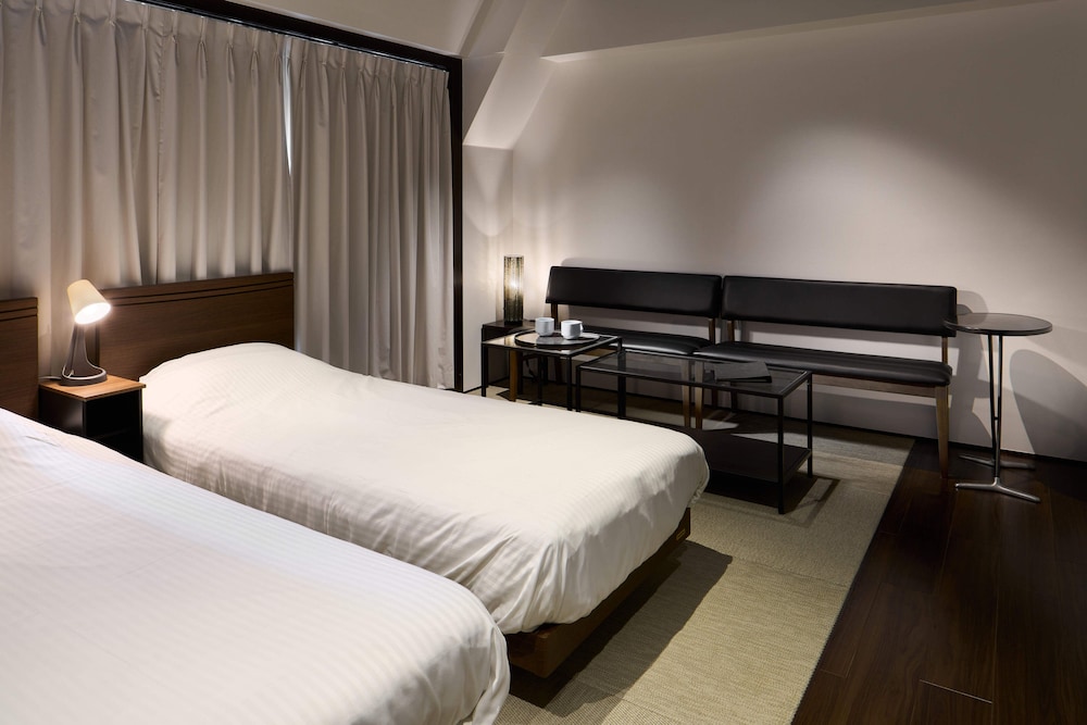 コンフォート ルーム ベッド (複数台) 禁煙 客室内のダイニングエリア1 | シティ ホテル N.U.T.S.