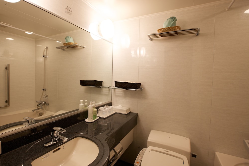 和洋室 禁煙 (ベッド2台+布団) マウンテンビュー【47㎡】 バスルーム0 | 宮島グランドホテル有もと