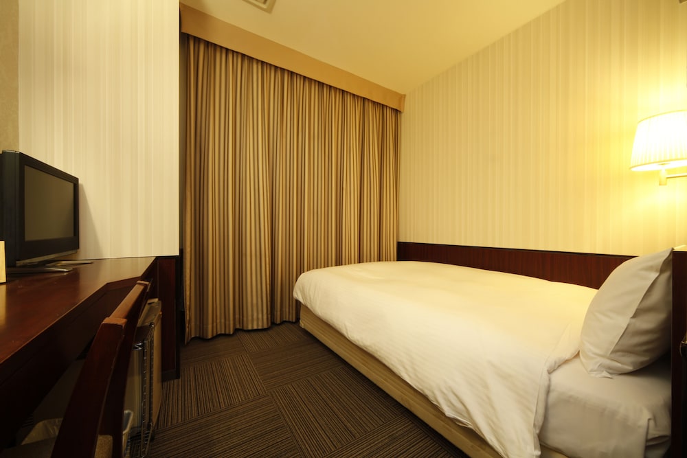 エコノミー ダブルルーム 喫煙可 (Unit Bath) 客室1 | ホテル ヒラリーズ