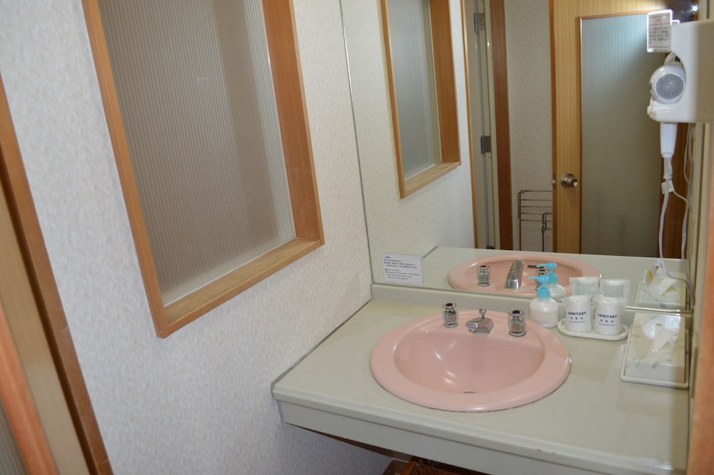 ４階和洋室60sqm　禁煙　ビーチビュー バスルームのシンク0 | 下田大和館