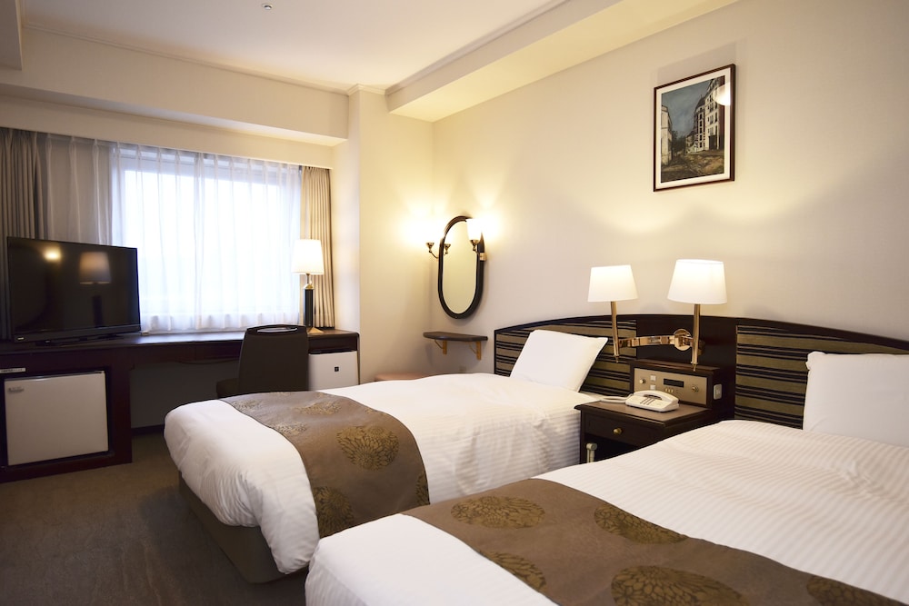 [隣接または向かい側のお部屋を確約] アジョイニングルーム 2寝室 4シングルベッド (大人12歳以上の方 最大4名様まで) | ホテルサンキョウ福島