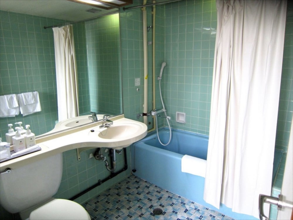 ダブルルーム 喫煙可 バスルーム0 | サンライズ観光ホテル