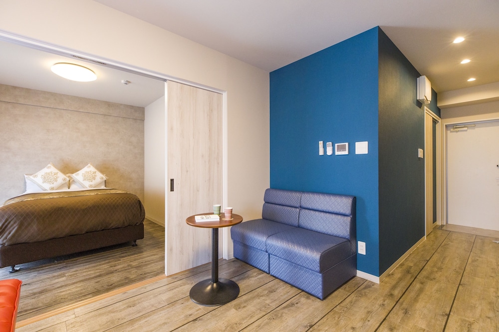 スーペリア ダブルルーム ダブルベッド 1 台ソファーベッド付き 禁煙 客室10 | ミスター金城 イン ぐすく