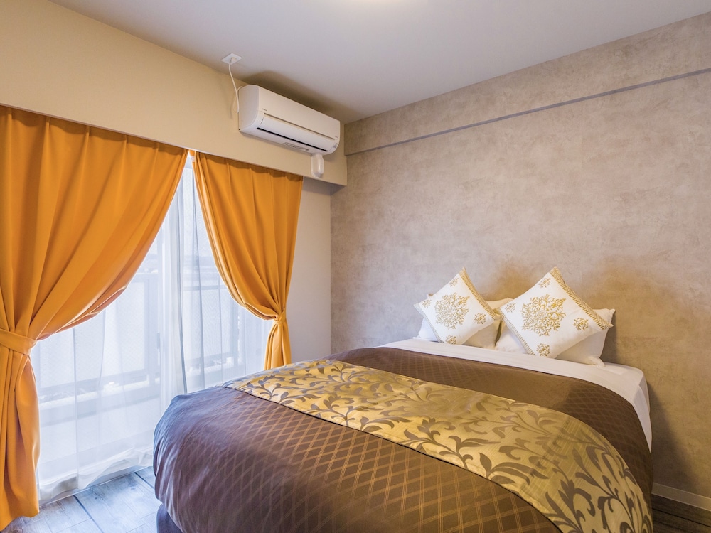 スーペリア ダブルルーム ダブルベッド 1 台ソファーベッド付き 禁煙 客室7 | ミスター金城 イン ぐすく