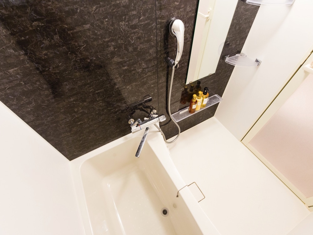 スーペリア ダブルルーム ダブルベッド 1 台ソファーベッド付き 禁煙 バスルーム0 | ミスター金城 イン ぐすく