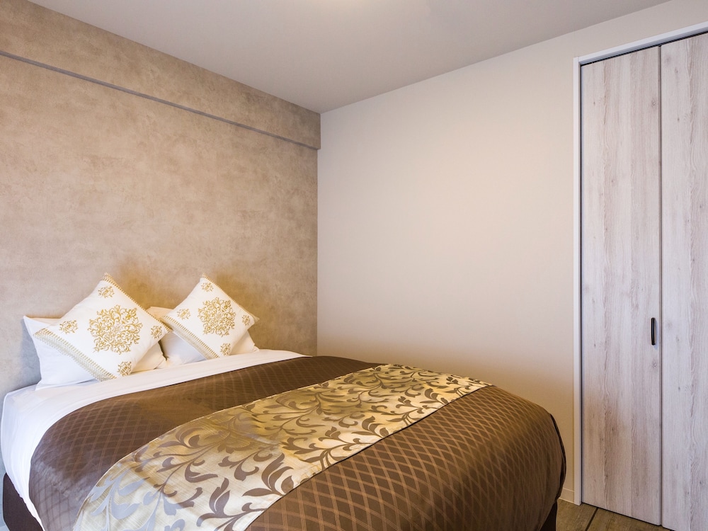 スーペリア ダブルルーム ダブルベッド 1 台ソファーベッド付き 禁煙 客室4 | ミスター金城 イン ぐすく