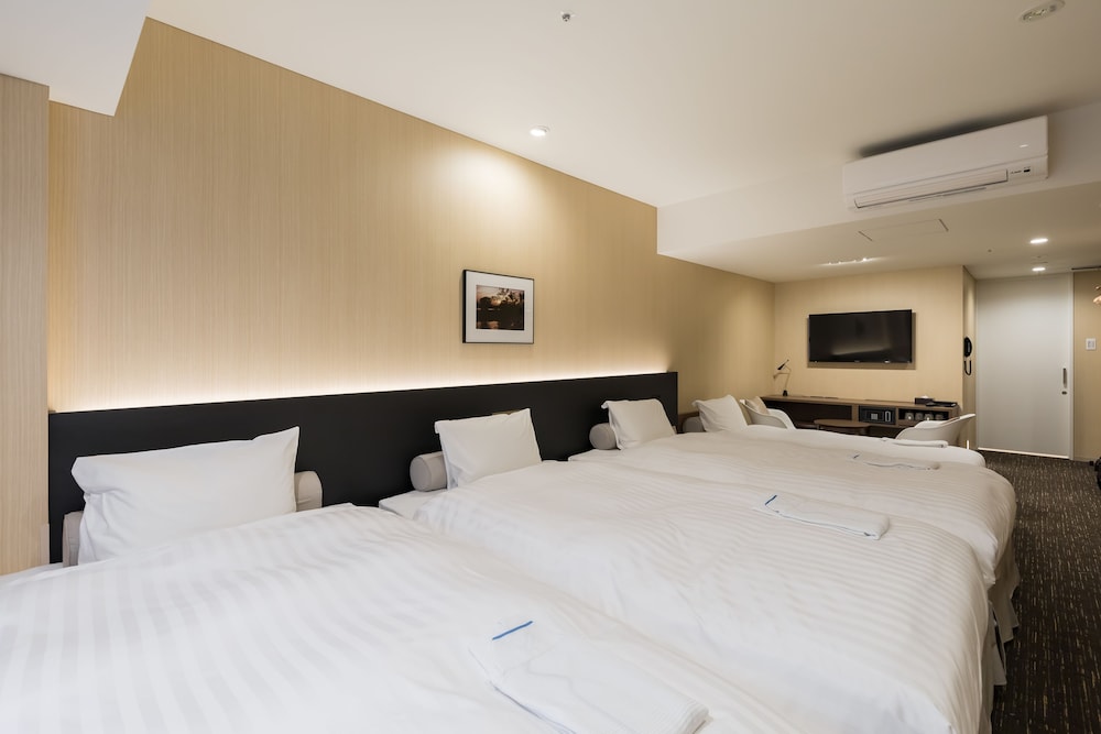 デラックスツインルーム 4名利用 禁煙 客室3 | 銀座キャピタルホテル 萌木