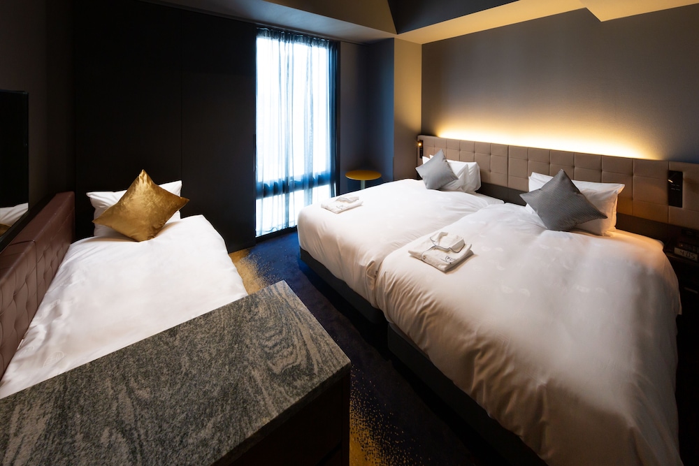 スーペリアツインB シングルベッド2台 禁煙 客室9 | ザ ロイヤルパーク キャンバス 銀座 8