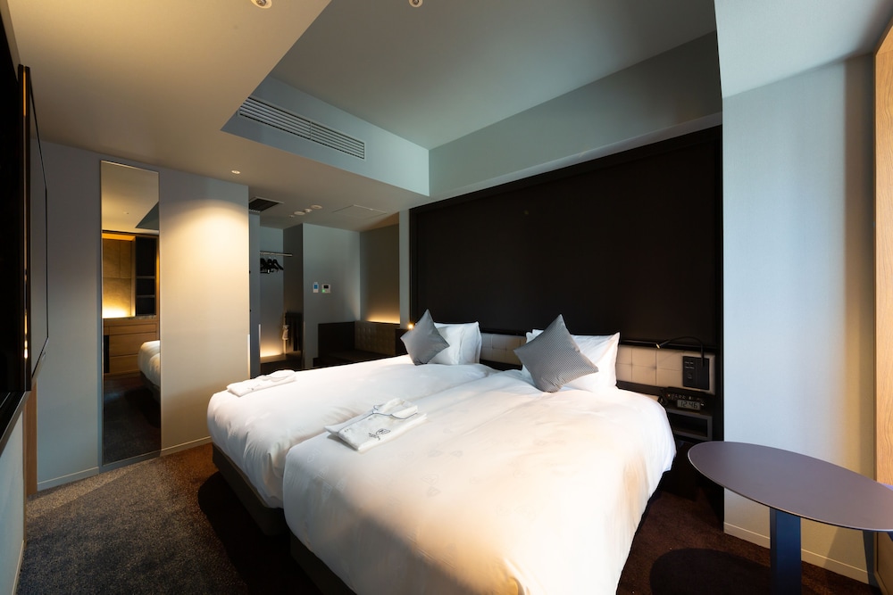 スーペリアツインA シングルベッド2台 禁煙 客室2 | ザ ロイヤルパーク キャンバス 銀座 8