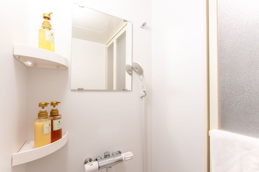 コンセプトルーム【トロピカル】 バスルームのシャワー0 | パームスプリングス 宮古島 リゾート