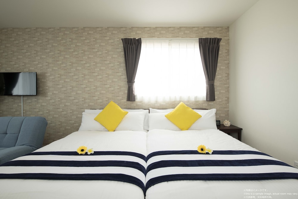 客室1 | パームスプリングス 宮古島 リゾート