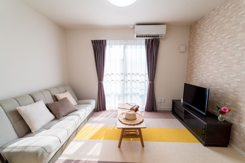 スーペリア　ツインルーム リビング エリア0 | パームスプリングス 宮古島 リゾート