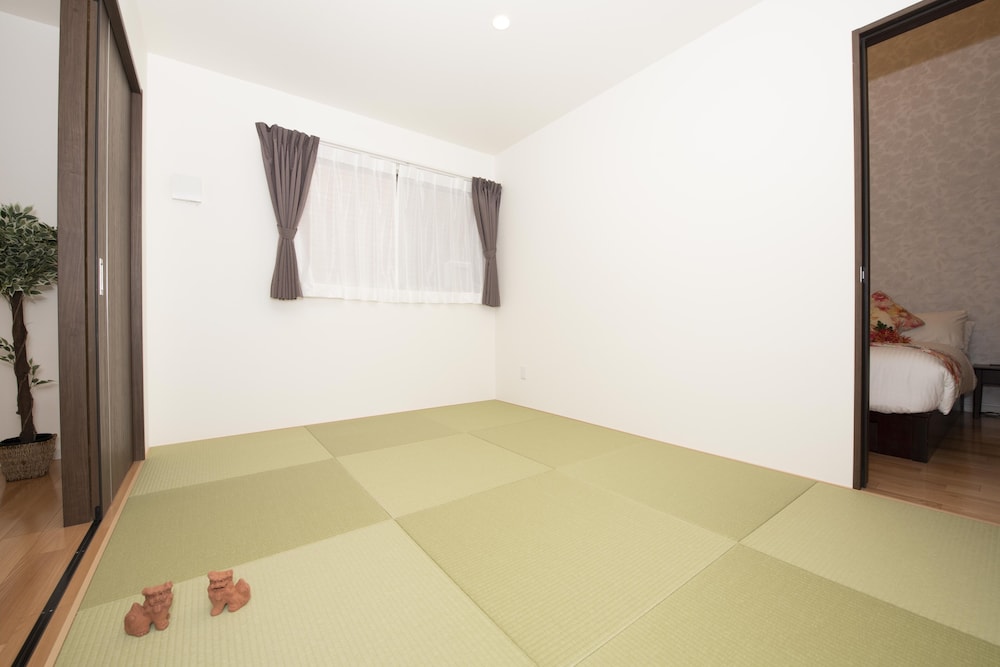 3LDK ヴィラ 客室1 | パームスプリングス 宮古島 リゾート