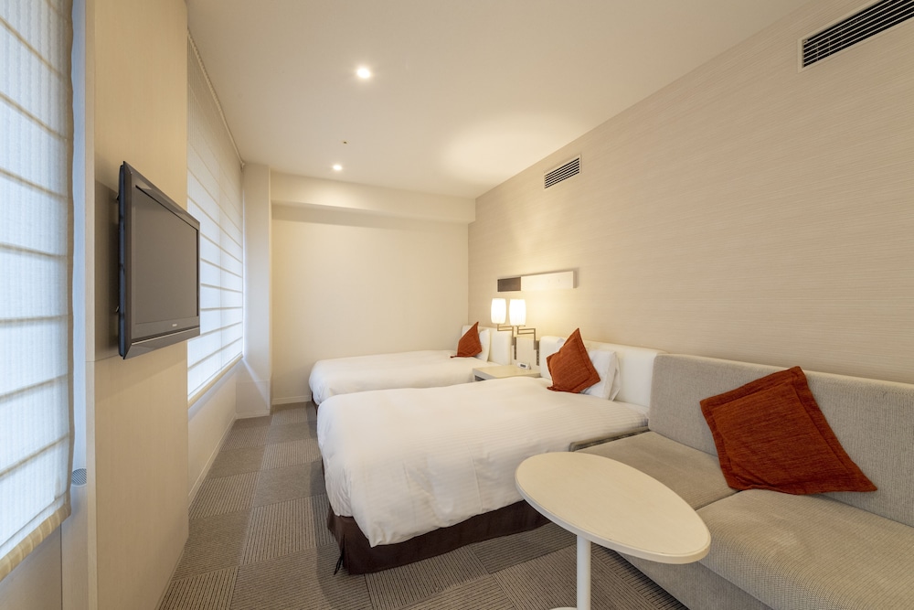 ユニバーサルルーム エキストラベッド付 禁煙 客室2 | ホテル京阪 東京四谷