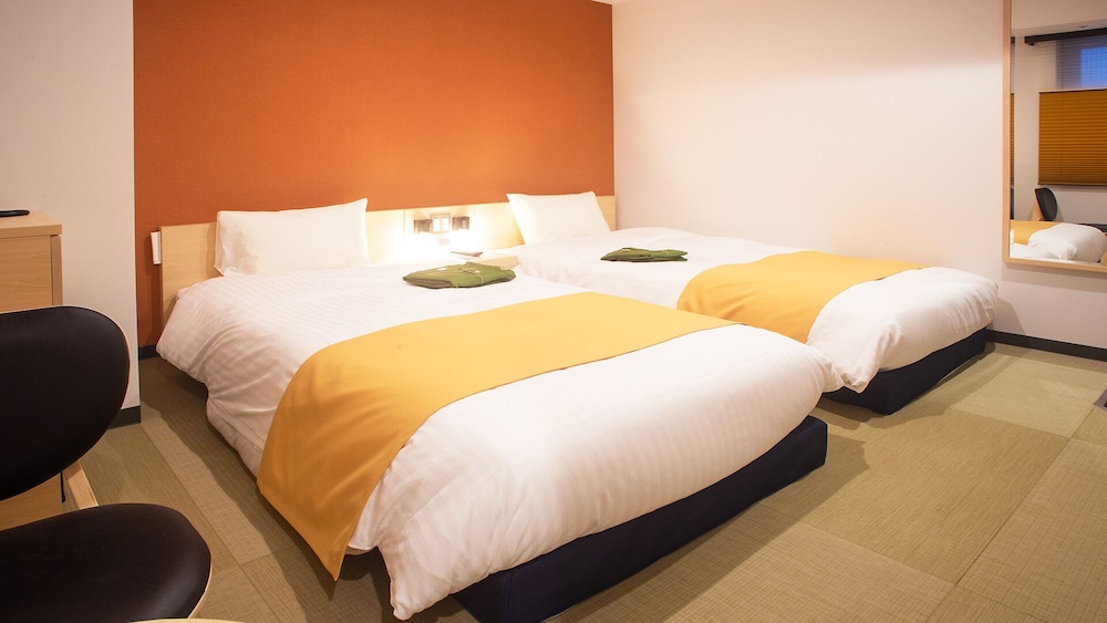 プレミア ツインルーム シングルベッド 2 台 禁煙 | ホテル呉竹荘 広島大手町