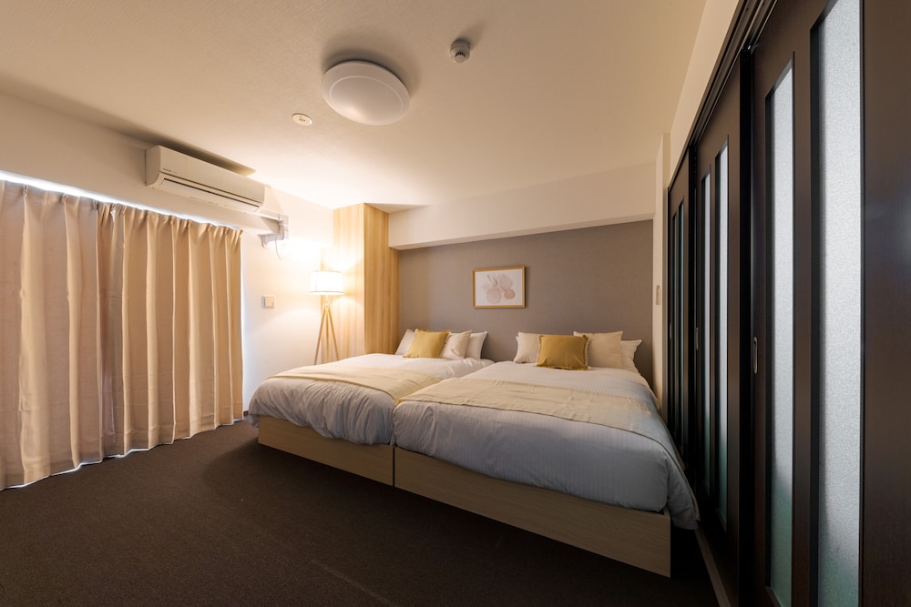 デラックスツインルーム 客室5 | TAKUTO STAY Sakaisuji Honmachi