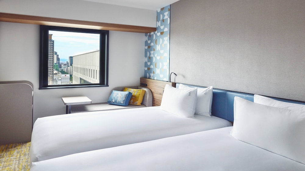 プレミアム ルーム シングルベッド 2 台 (High Floor, Free Breakfast) 客室1 | ホリデイ・インエクスプレス大阪シティセンター御堂筋 by IHG