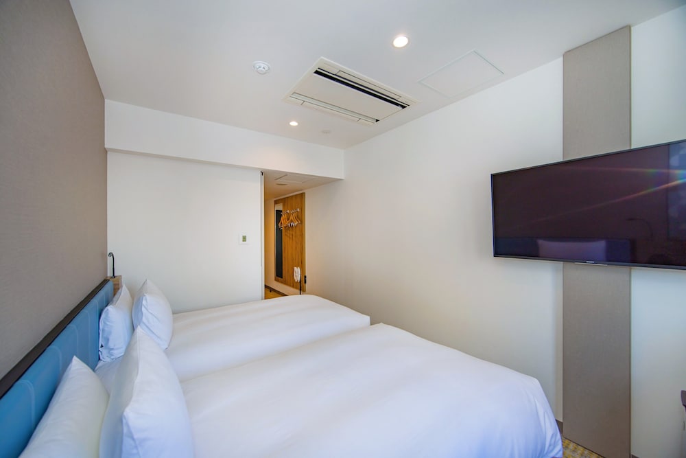 ルーム シングルベッド 2 台 (Free Breakfast) 客室2 | ホリデイ・インエクスプレス大阪シティセンター御堂筋 by IHG
