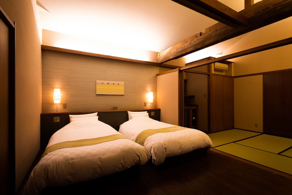 和室7.5帖+ツインベッド 庭園露天風呂付き (Aタイプ) 客室1 | 湊のやど 汀家