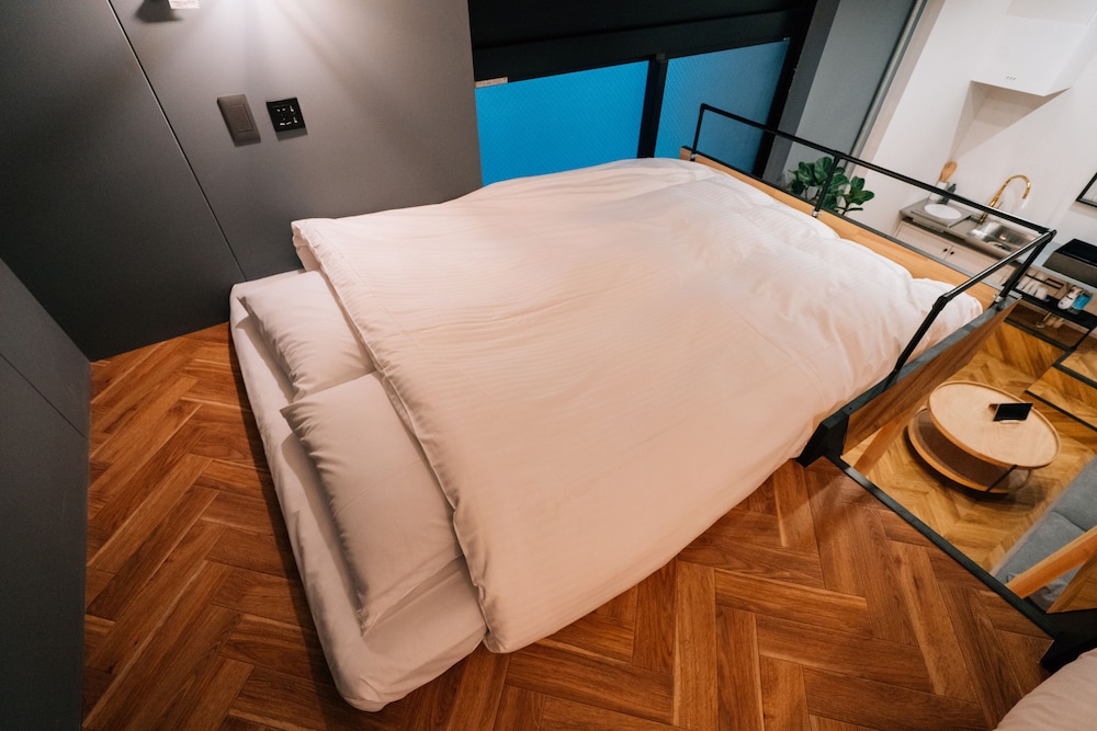 デラックス スタジオ ベッド (複数台) テラス 客室7 | mizuka Daimyo 3 ‐unmanned hotel‐